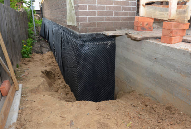 Happy homeowners after waterproofing job in Olmsted Falls
